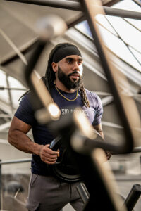 An athlete having their professional photos taken for a gym photoshoot in North London